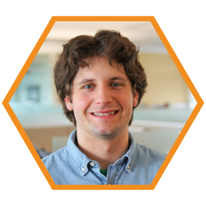 Headshot of Mechanical Engineer Dalton Carstens in an orange hexagon frame. 