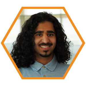 Headshot of Mechanical Engineer Zarius Buharivala in an orange hexagon frame.