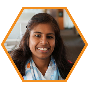 Headshot of Plumbing Designer Pallavi Gopalakrishna in an orange hexagon frame.