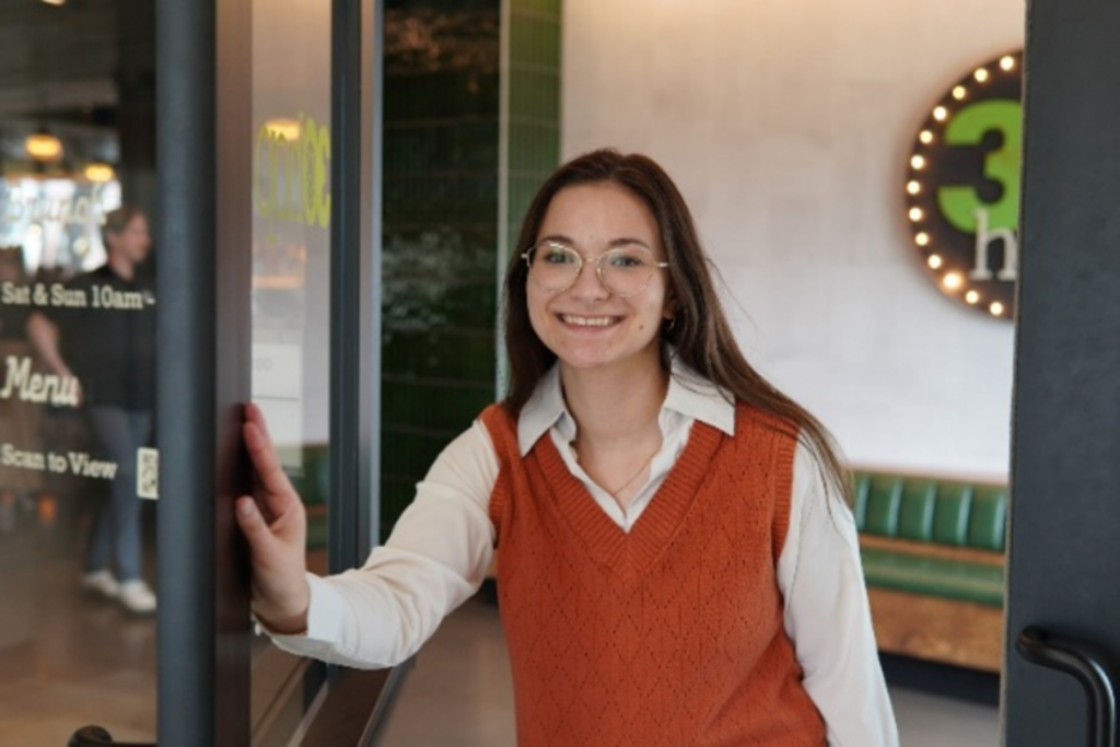 Natalie Canessa at the entrance of 30Hop.